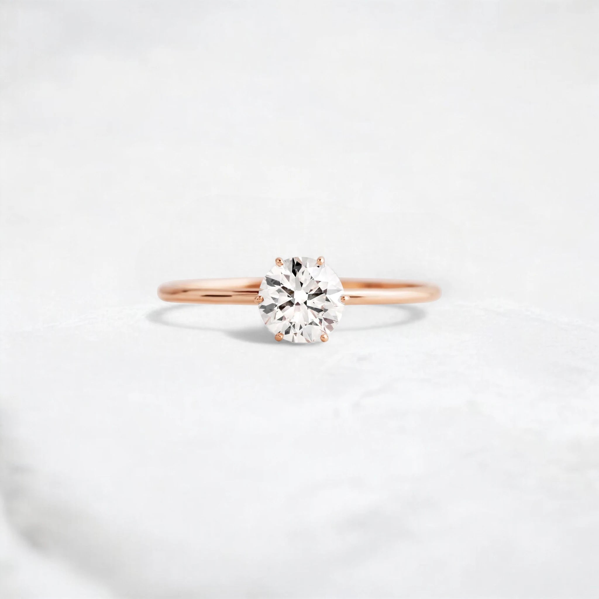 0.70ct-golden-round-cut-moissanite-diamond-engagement-ring-rose-gold-gemfora-1