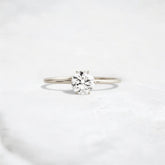 golden-promise-glow-1.0ct-round-cut-moissanite-diamond-engagement-hidden-halo-ring