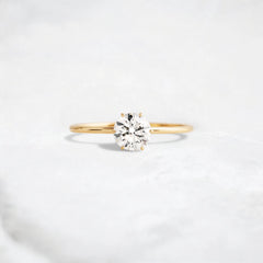 golden-promise-glow-1.0ct-round-cut-moissanite-diamond-engagement-hidden-halo-ring
