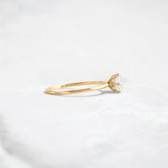 0.70ct-golden-round-cut-moissanite-diamond-engagement-ring-yellow-gold-gemfora-3