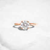 1.5CT Round Cut Solitaire Moissanite Engagement Ring with Triple Prong Open Basket Setting