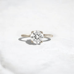 1.5CT Round Cut Solitaire Moissanite Engagement Ring with Triple Prong Open Basket Setting