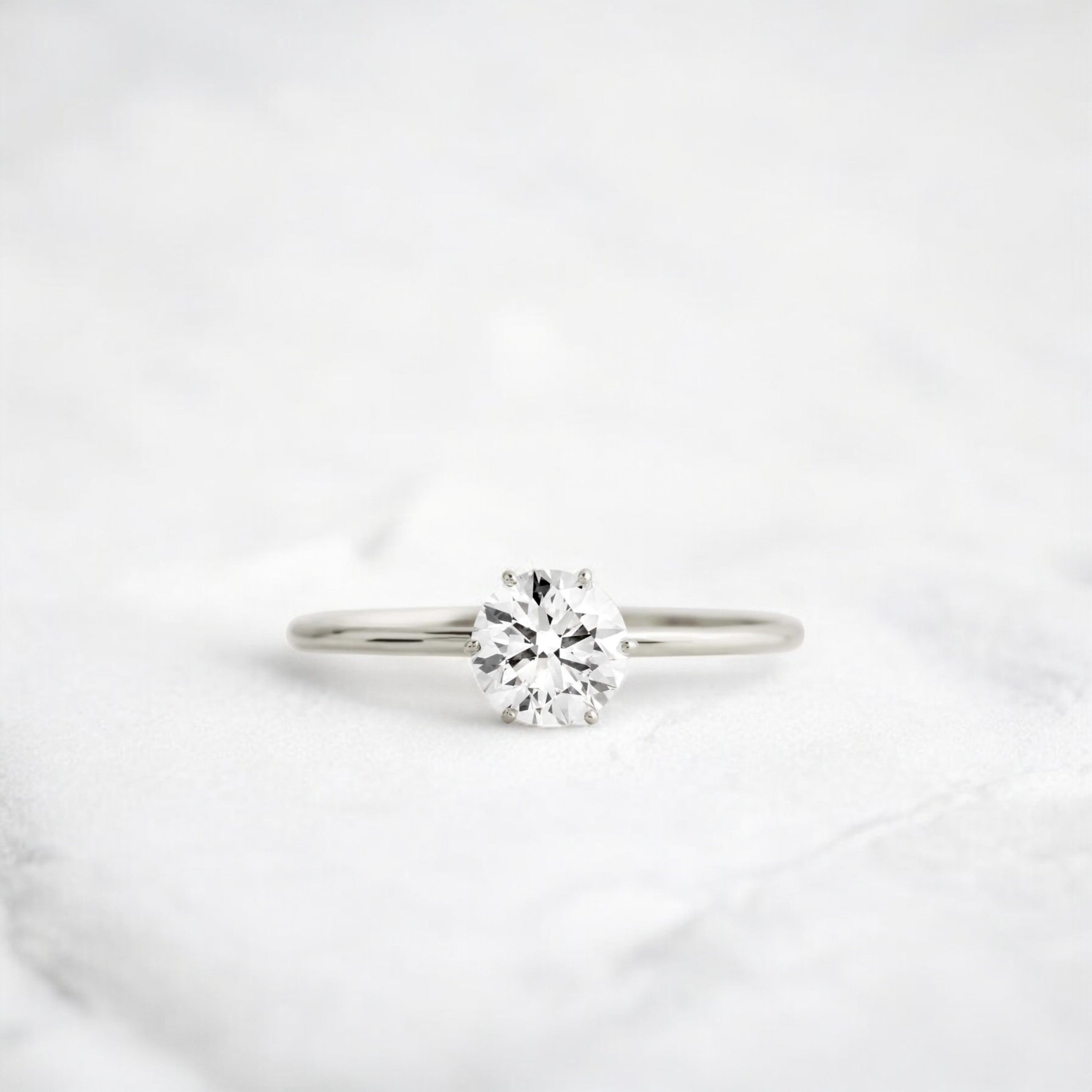 1ct-golden-round-cut-moissanite-diamond-engagement-ring-platinum-gemfora-1