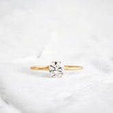 1ct-golden-round-cut-moissanite-diamond-engagement-ring-yellow-gold-gemfora-1