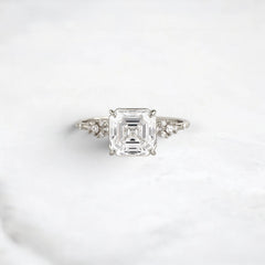 2 Carat Asscher Cut Moissanite Engagement Ring with Cluster Side Stones