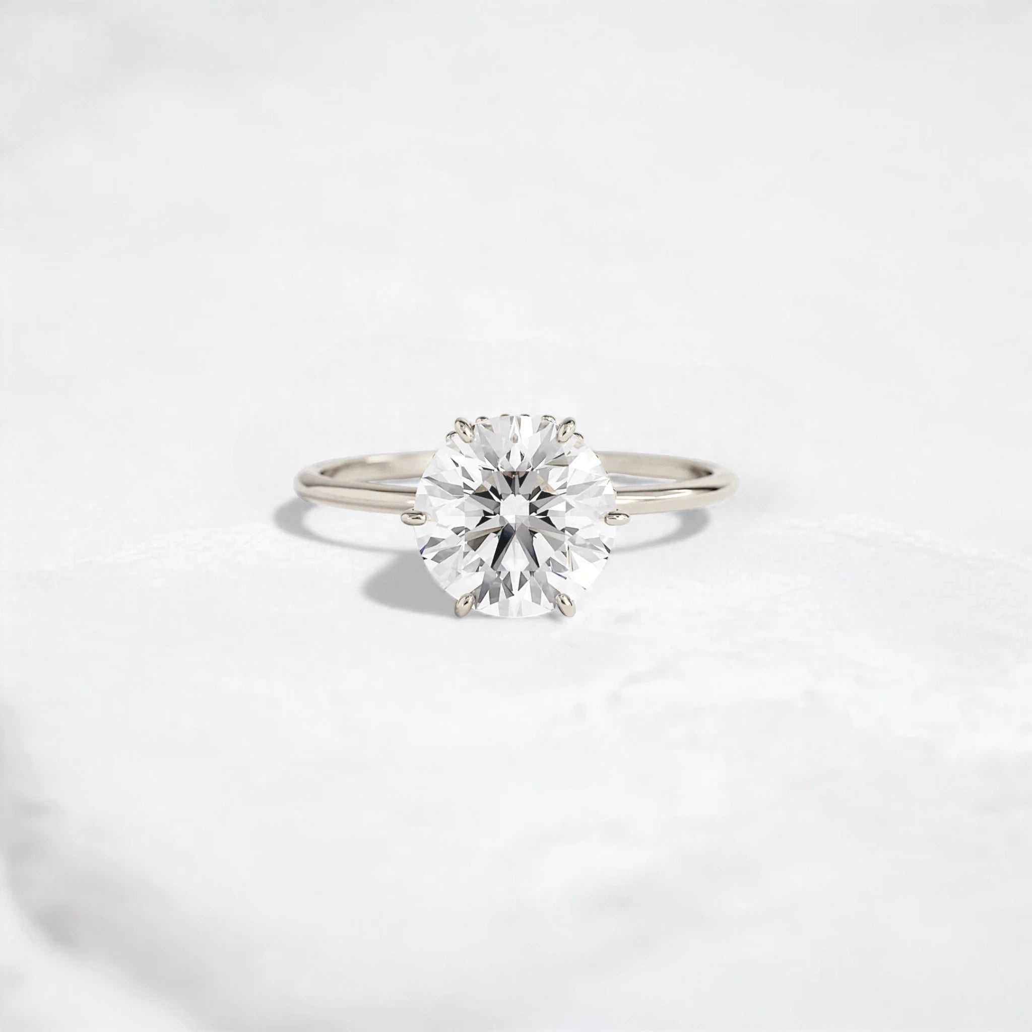 2ct-golden-round-cut-moissanite-diamond-engagement-ring-platinum-gemfora-1