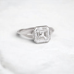 3.13CT Asscher Cut Moissanite Bezel Engagement Ring with Pear Side Stones in 14K Yellow Gold