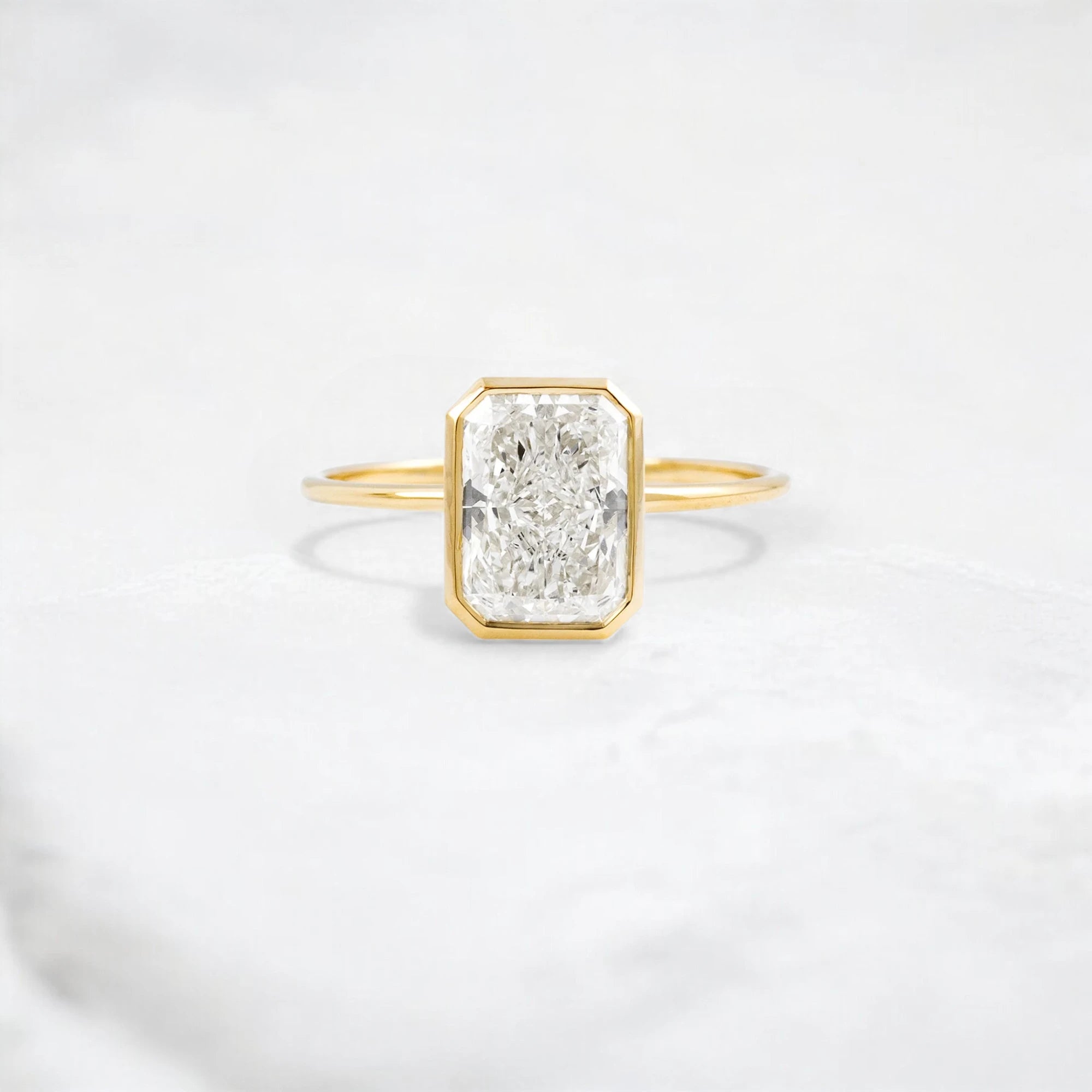 bezel-design-radiant-cut-2ct-focal-stone-engagement-ring-1