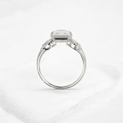 bezel-emerald-moissanite-engagement-ring-pear-side-sparkle-stones-3-ct-platinum-gold-gemfora-4