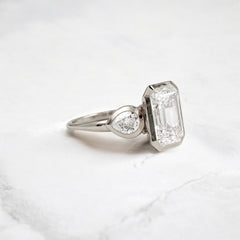 bezel-emerald-moissanite-engagement-ring-pear-side-sparkle-stones-3-ct-white-gold-gemfora-2