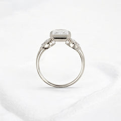 bezel-emerald-moissanite-engagement-ring-pear-side-sparkle-stones-3-ct-white-gold-gemfora-4