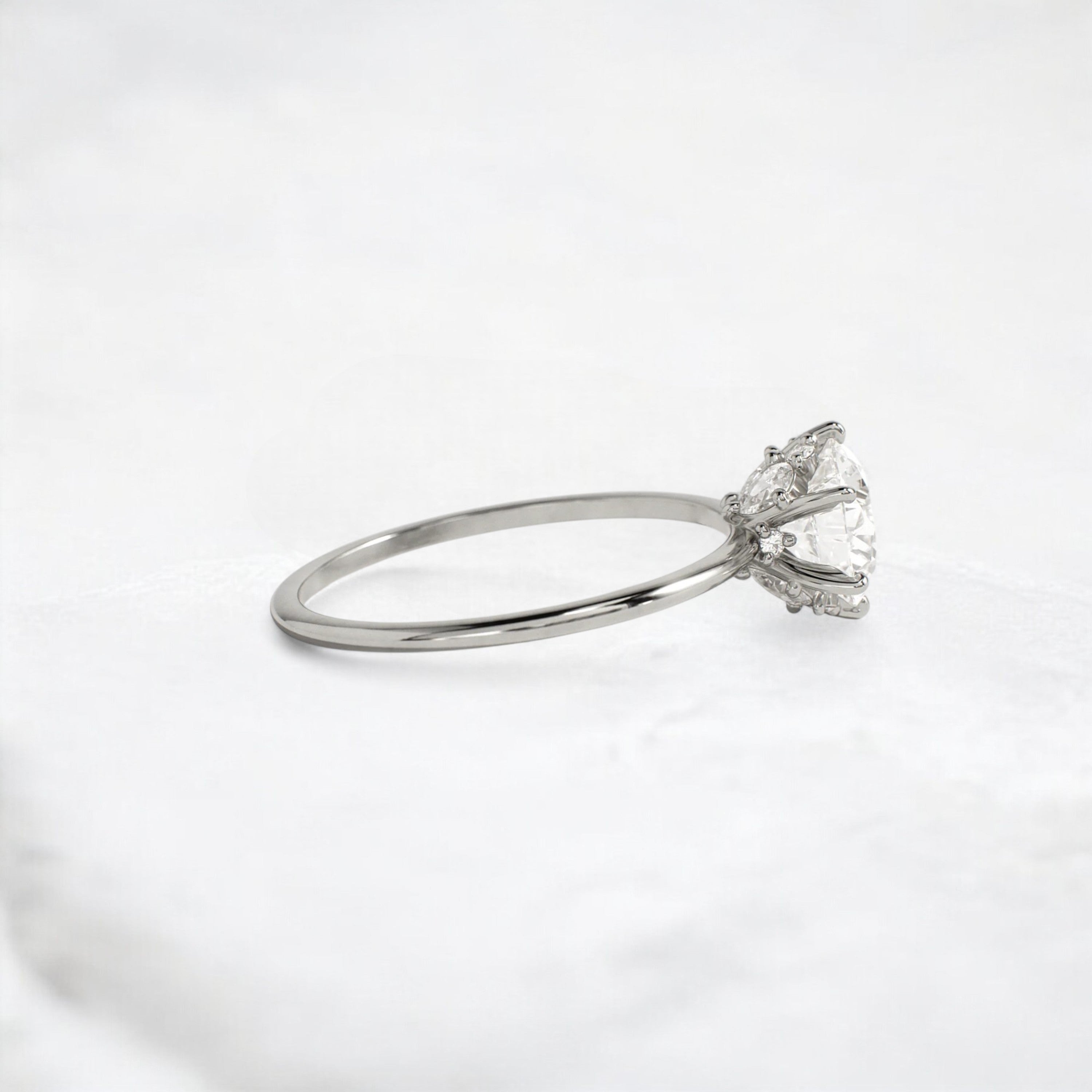 blossom-shine-round-pear-accents-moissanite-solitaire-ring-1-20-ct-platinum-gemfora-3