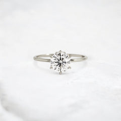 blossom-shine-round-pear-accents-moissanite-solitaire-ring-1-20-ct-white-gold-gemfora-1