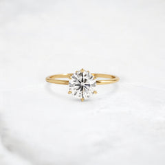 blossom-shine-round-pear-accents-moissanite-solitaire-ring-1-20-ct-yellow-gold-gemfora-1