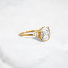 bright-eligence-2ct-cushion-cut-bezel-engagement-ring-3