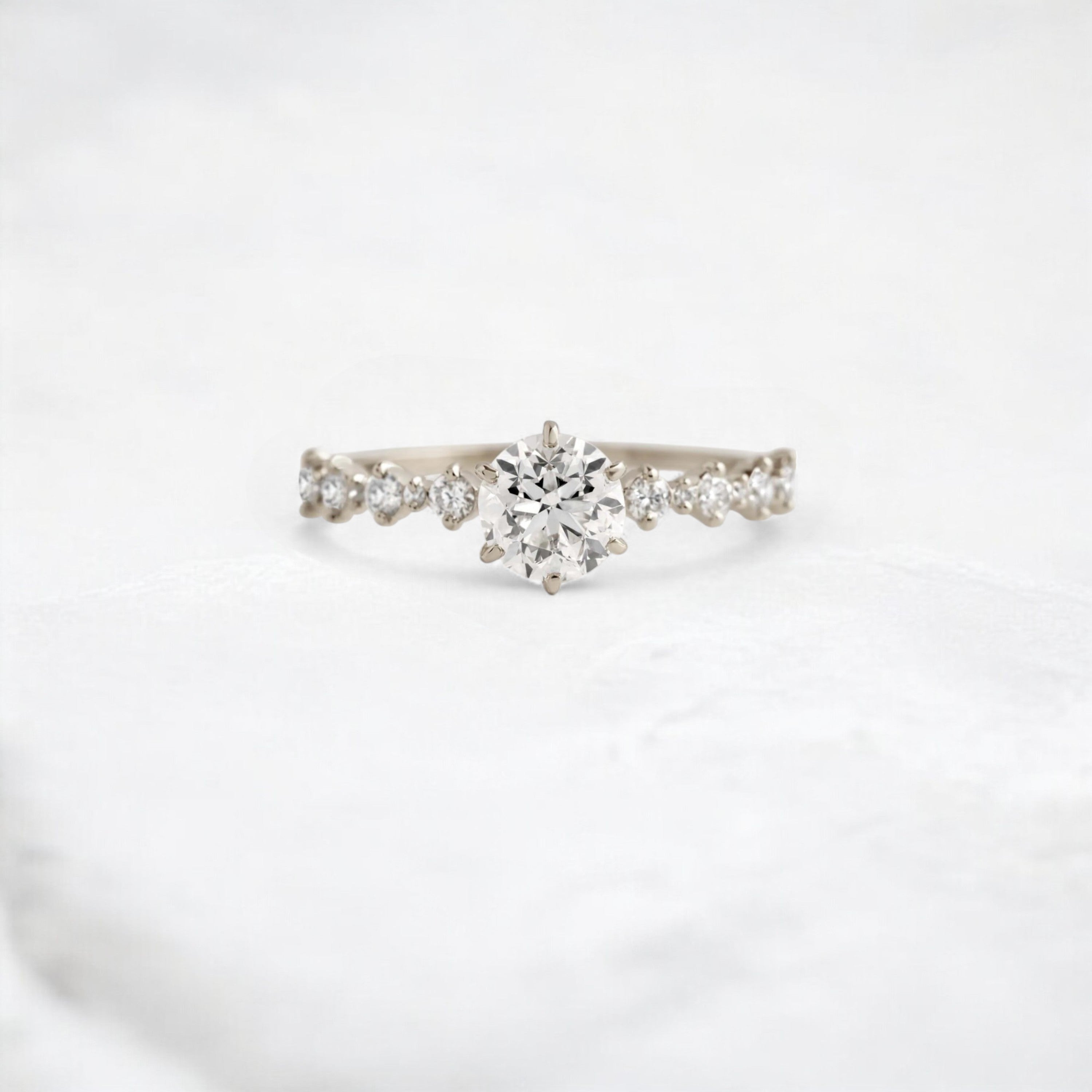 crystal-path-round-pave-moissanite-engagement-love-ring-0-9-ct-white-gold-gemfora-1