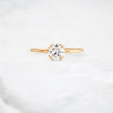 dawnfire-sparkle-round-cut-cluster-moissanite-engagement-ring-0-70-ct-yellow-gold-gemfora-1