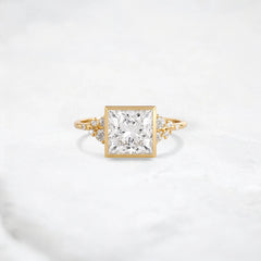 elegant-bezel-with-cluster-princess-cut-2ct-engagement-ring-1