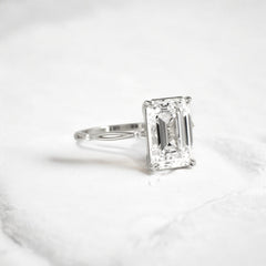 emerald-cut-engagement-ring-classic-crossed-moissanite-band-4-ct-platinum-gemfora-2