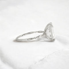 emerald-cut-engagement-ring-classic-crossed-moissanite-band-4-ct-platinum-gemfora-3