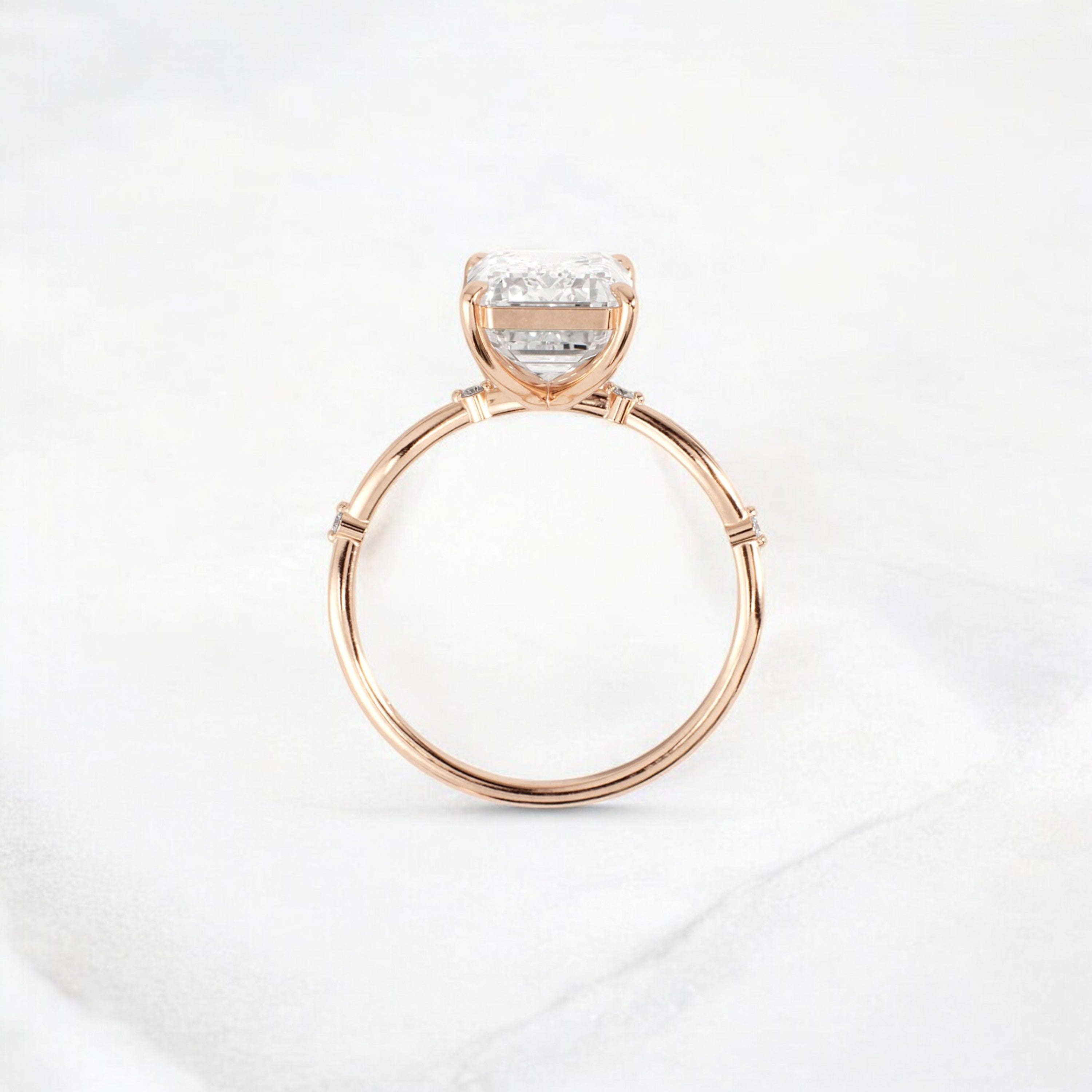 emerald-cut-engagement-ring-classic-crossed-moissanite-band-4-ct-rose-gold-gemfora-4
