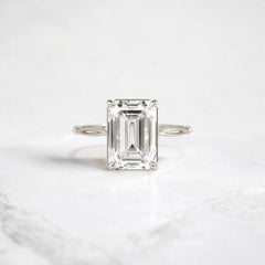 emerald-cut-engagement-ring-classic-crossed-moissanite-band-4-ct-white-gold-gemfora-1