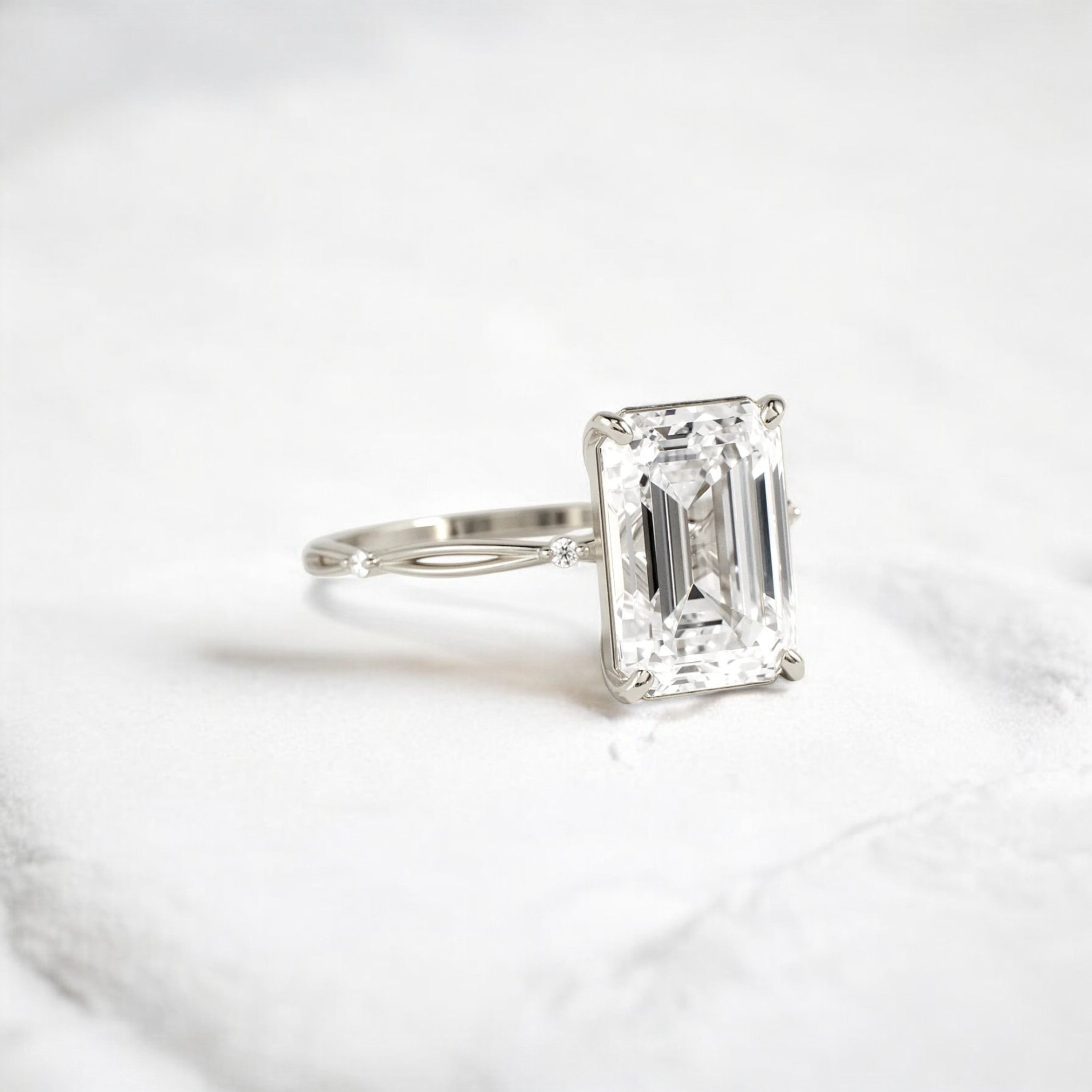 emerald-cut-engagement-ring-classic-crossed-moissanite-band-4-ct-white-gold-gemfora-2