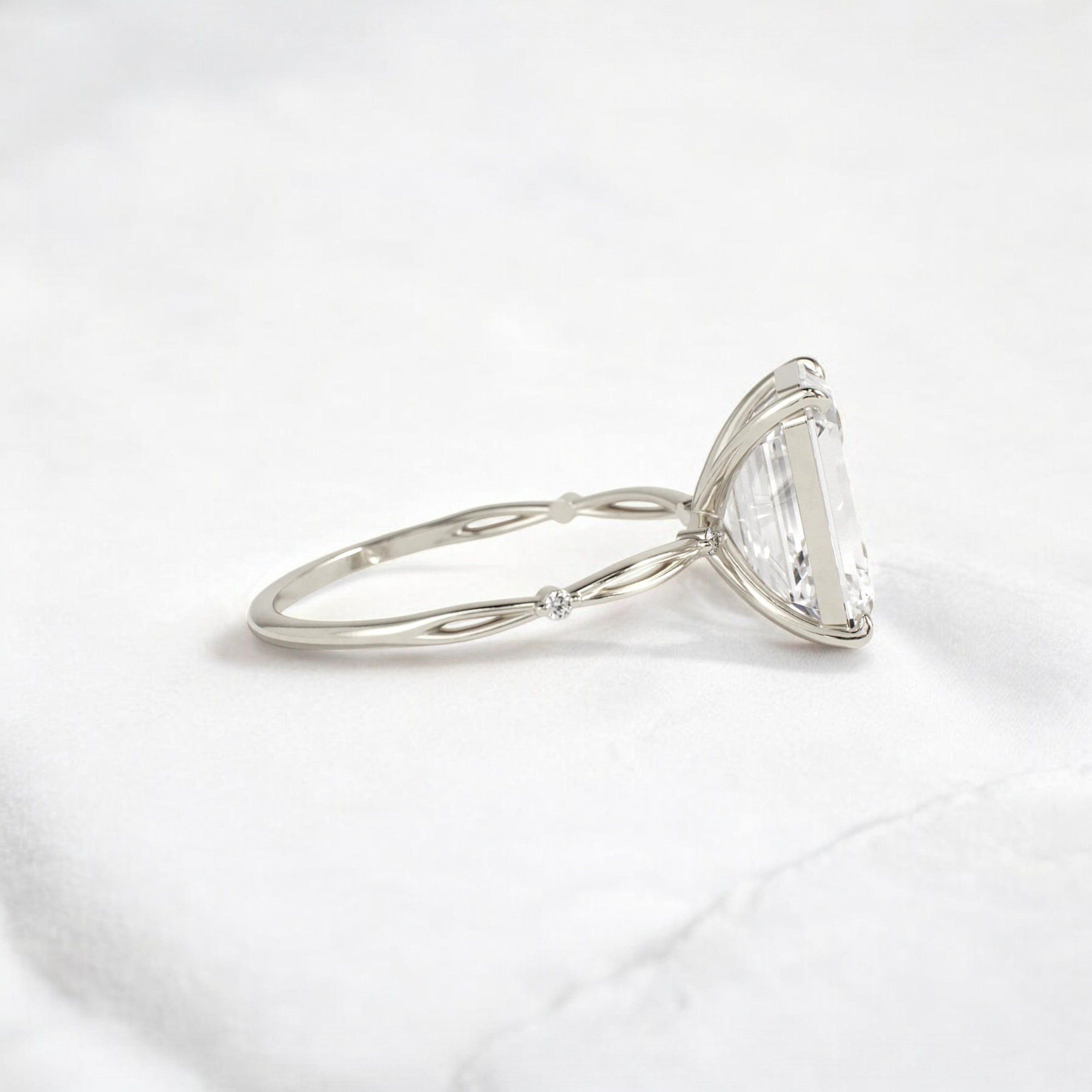 emerald-cut-engagement-ring-classic-crossed-moissanite-band-4-ct-white-gold-gemfora-3