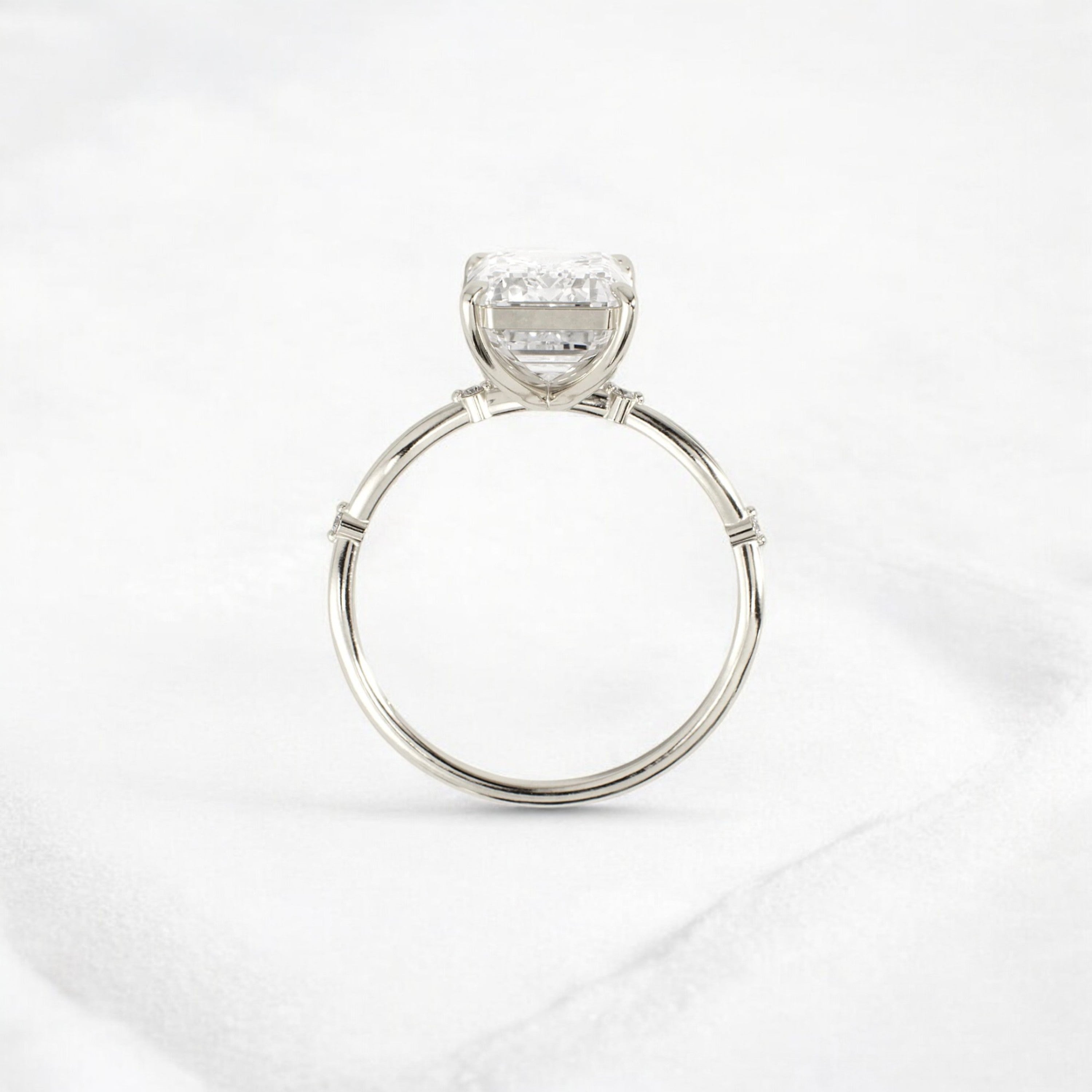 emerald-cut-engagement-ring-classic-crossed-moissanite-band-4-ct-white-gold-gemfora-4