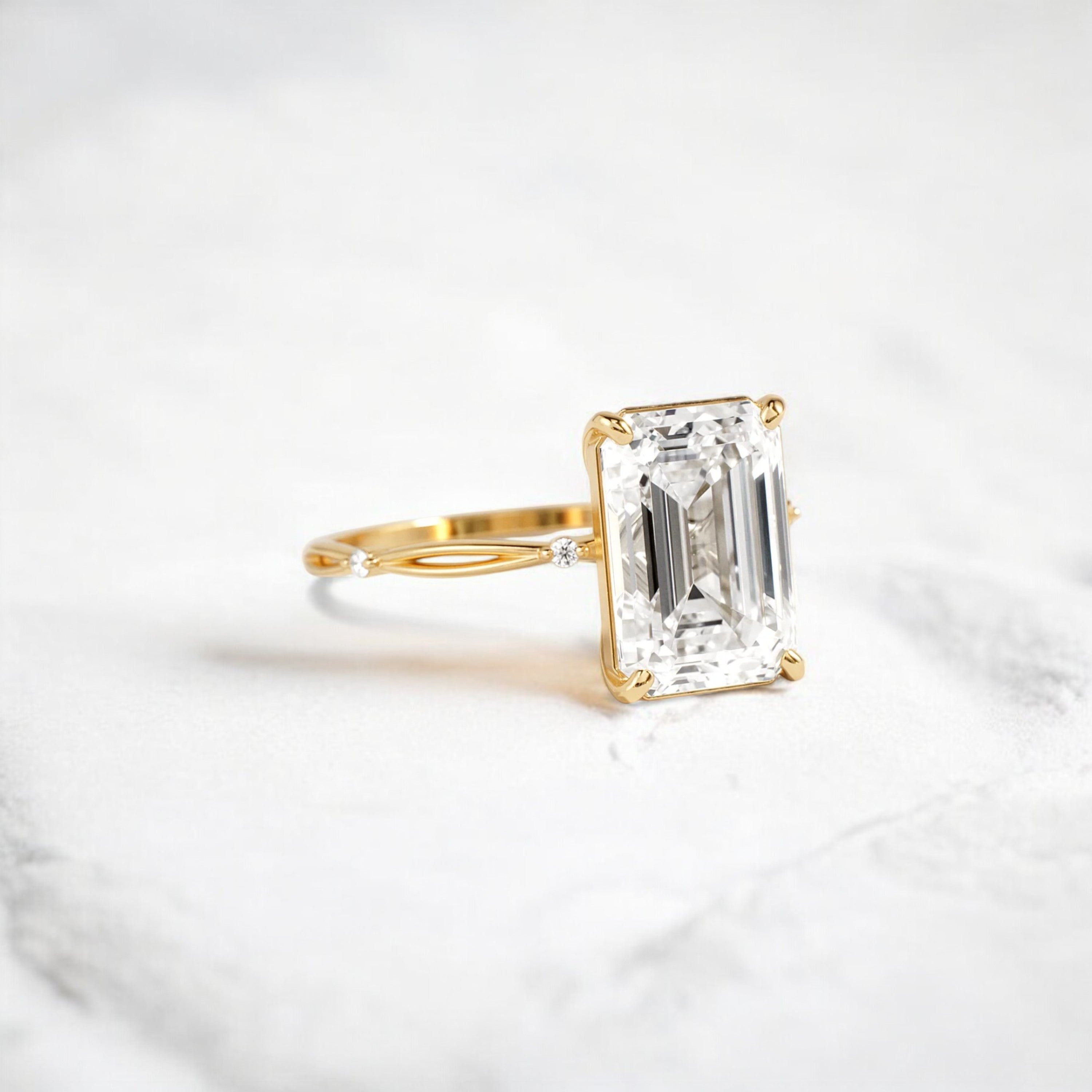 emerald-cut-engagement-ring-classic-crossed-moissanite-band-4-ct-yellow-gold-gemfora-2