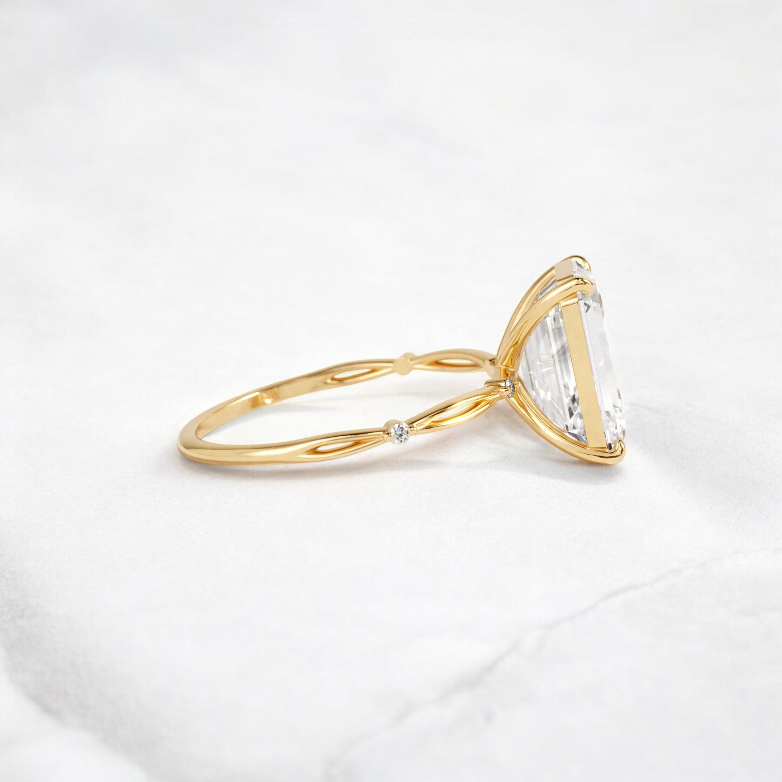 emerald-cut-engagement-ring-classic-crossed-moissanite-band-4-ct-yellow-gold-gemfora-3