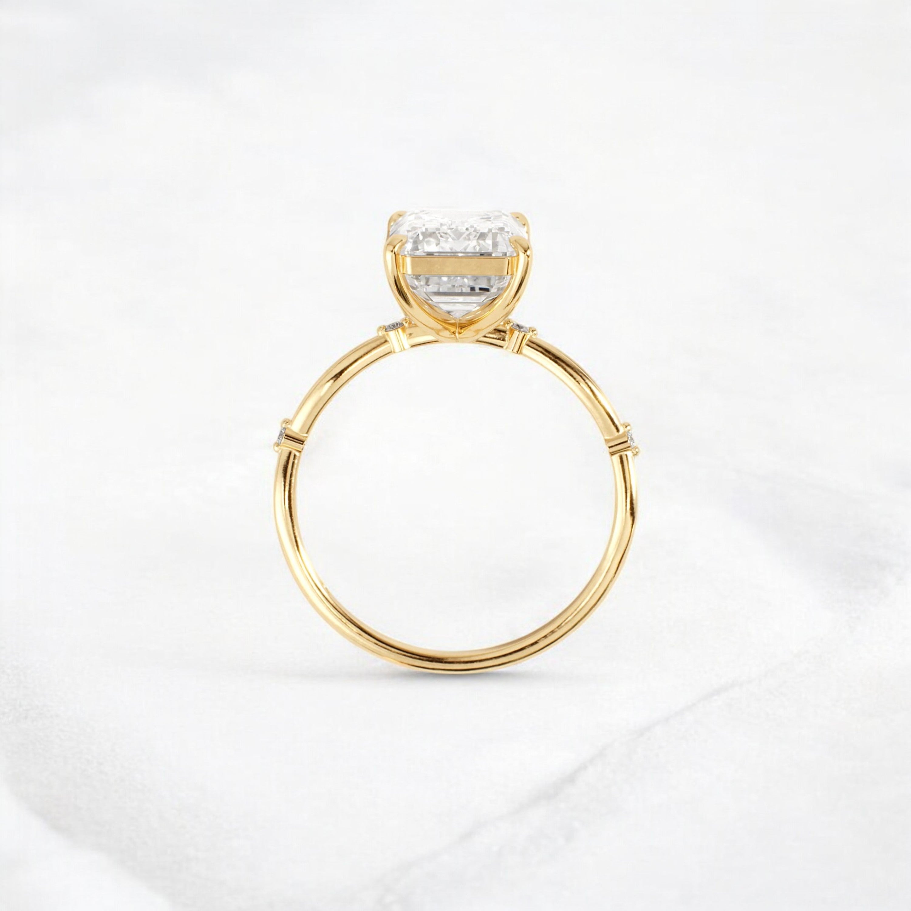 emerald-cut-engagement-ring-classic-crossed-moissanite-band-4-ct-yellow-gold-gemfora-4