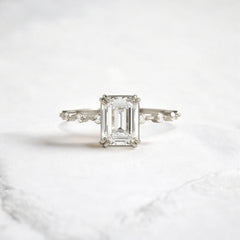 Handmade emerald diamond engagement ring with pave setting floating round double prong