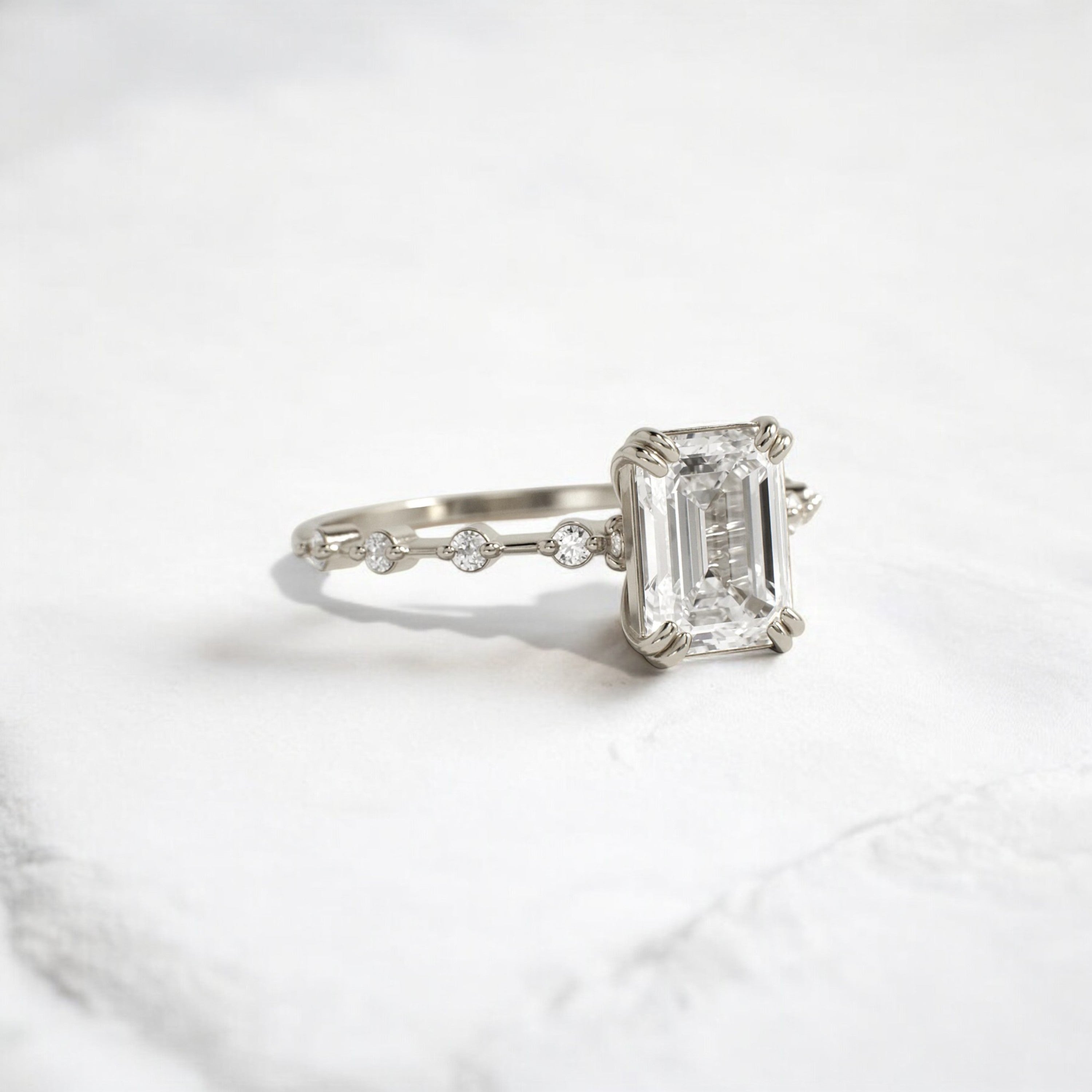 Handmade emerald diamond engagement ring with pave setting floating round double prong