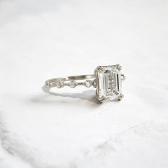 Handmade emerald diamond engagement ring with pave setting floating round double prong