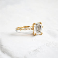 Handmade emerald diamond engagement ring with pave setting floating round double prong