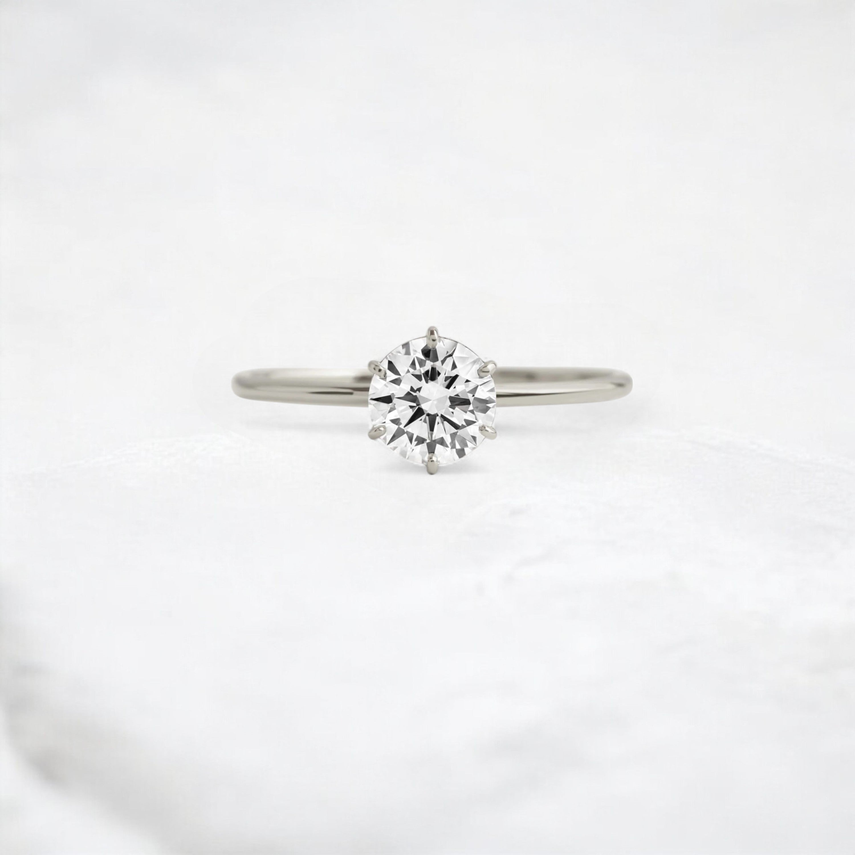 endless-love-round-moissanite-ring-in-golden-embrace-shine-0-7-ct-platinum-gemfora-1