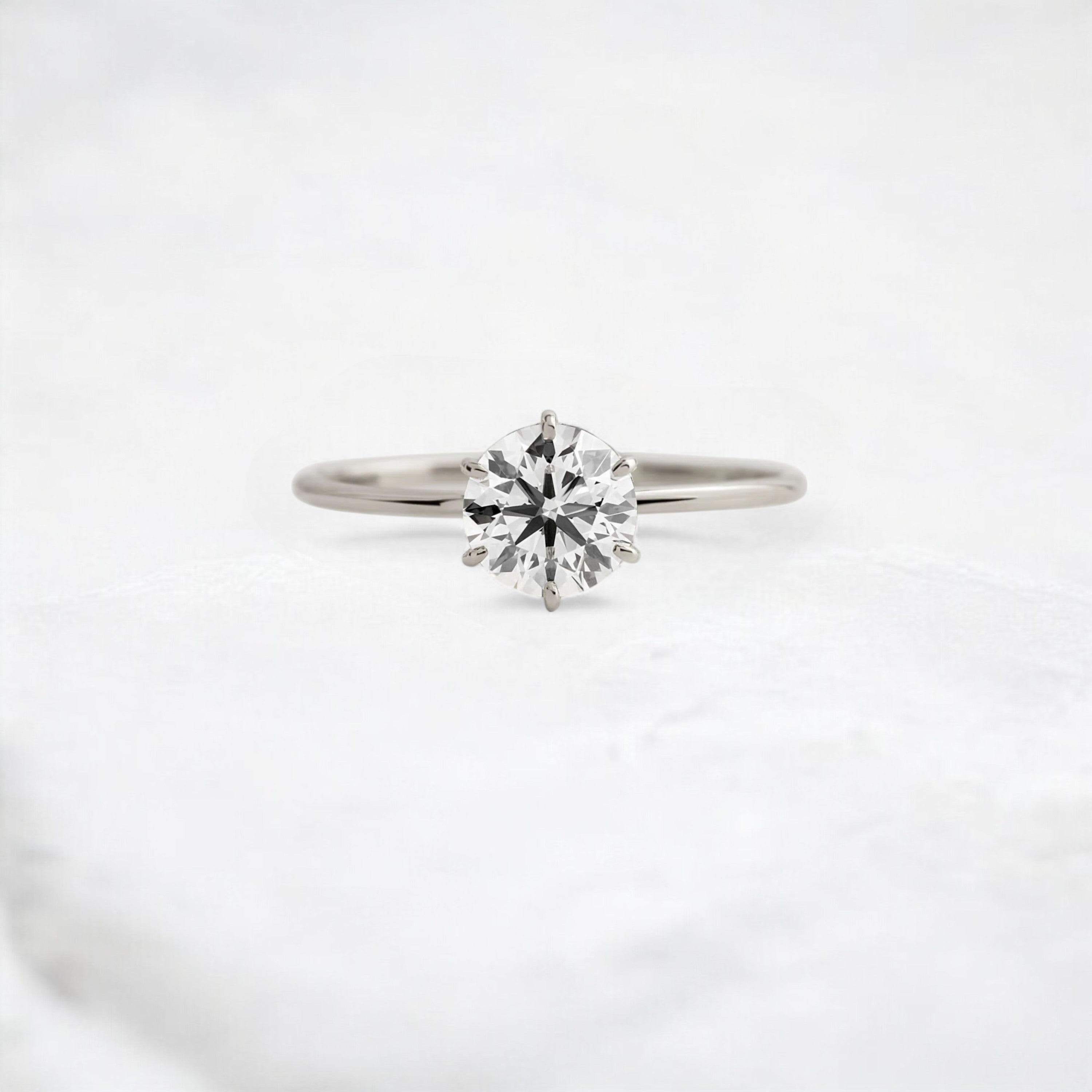 endless-love-round-moissanite-ring-in-golden-embrace-shine-1-ct-platinum-gemfora-1