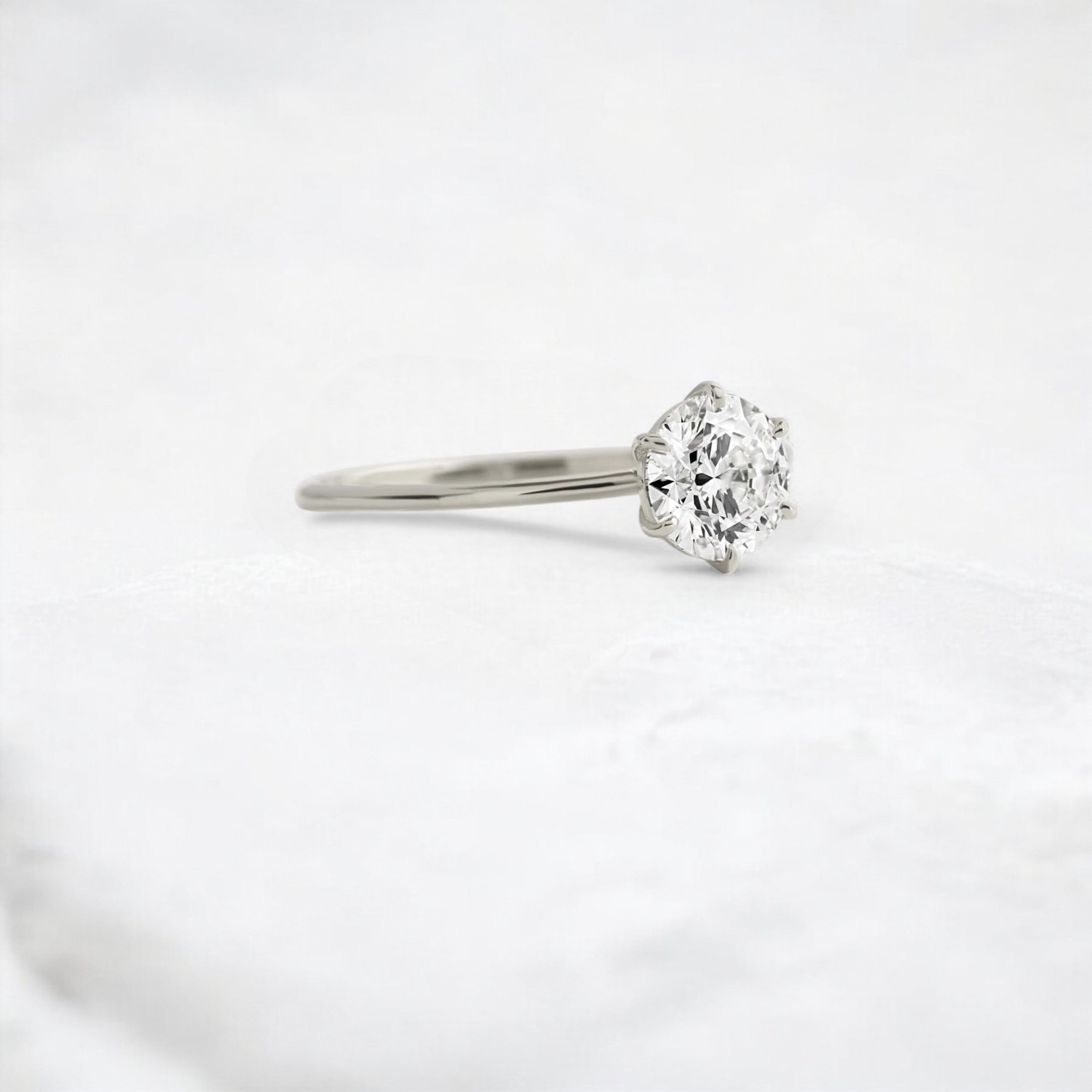 endless-love-round-moissanite-ring-in-golden-embrace-shine-1-ct-platinum-gemfora-2