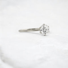 endless-love-round-moissanite-ring-in-golden-embrace-shine-1-ct-platinum-gemfora-2