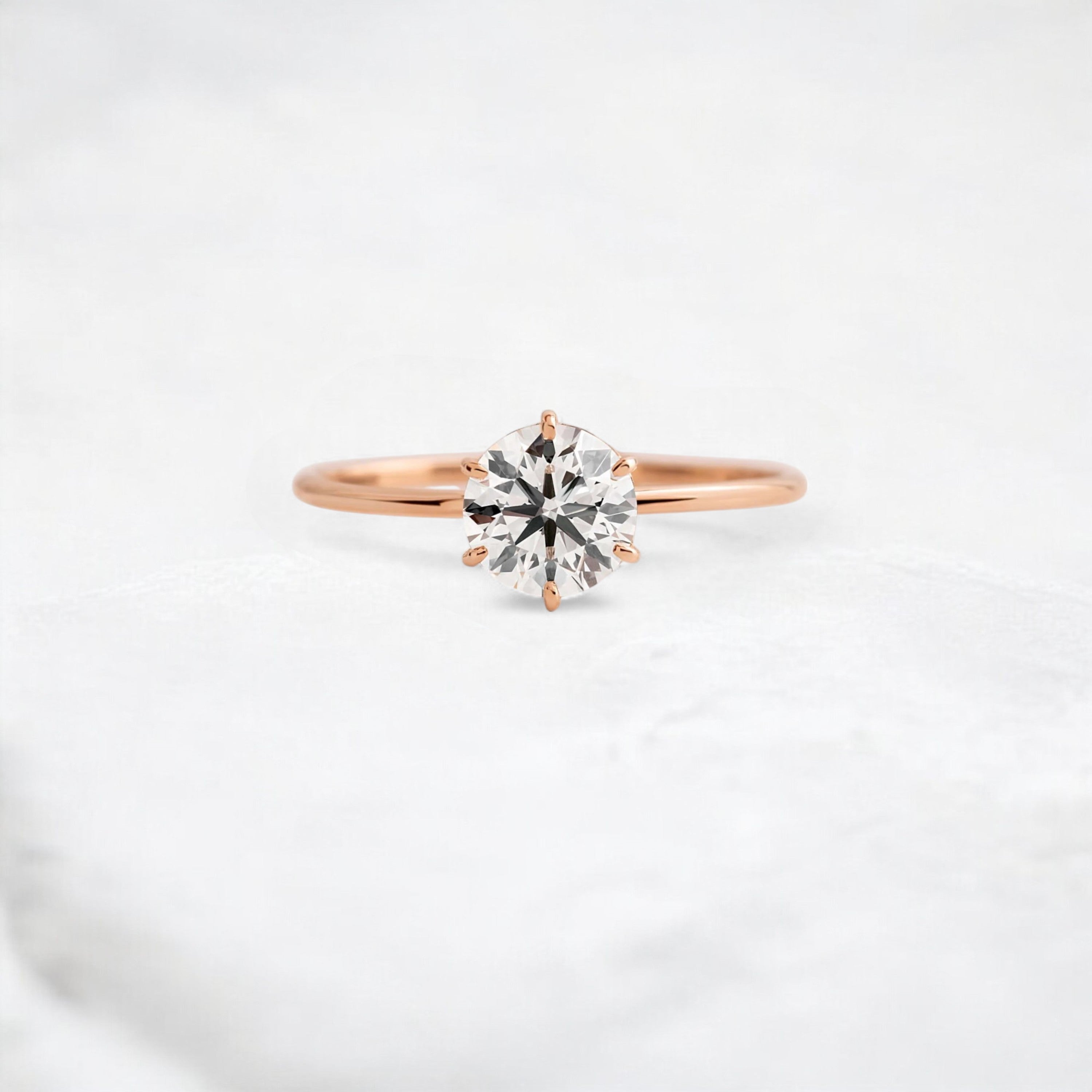 endless-love-round-moissanite-ring-in-golden-embrace-shine-1-ct-rose-gold-gemfora-1