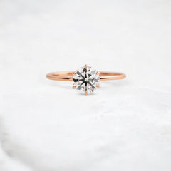 endless-love-round-moissanite-ring-in-golden-embrace-shine-1-ct-rose-gold-gemfora-1