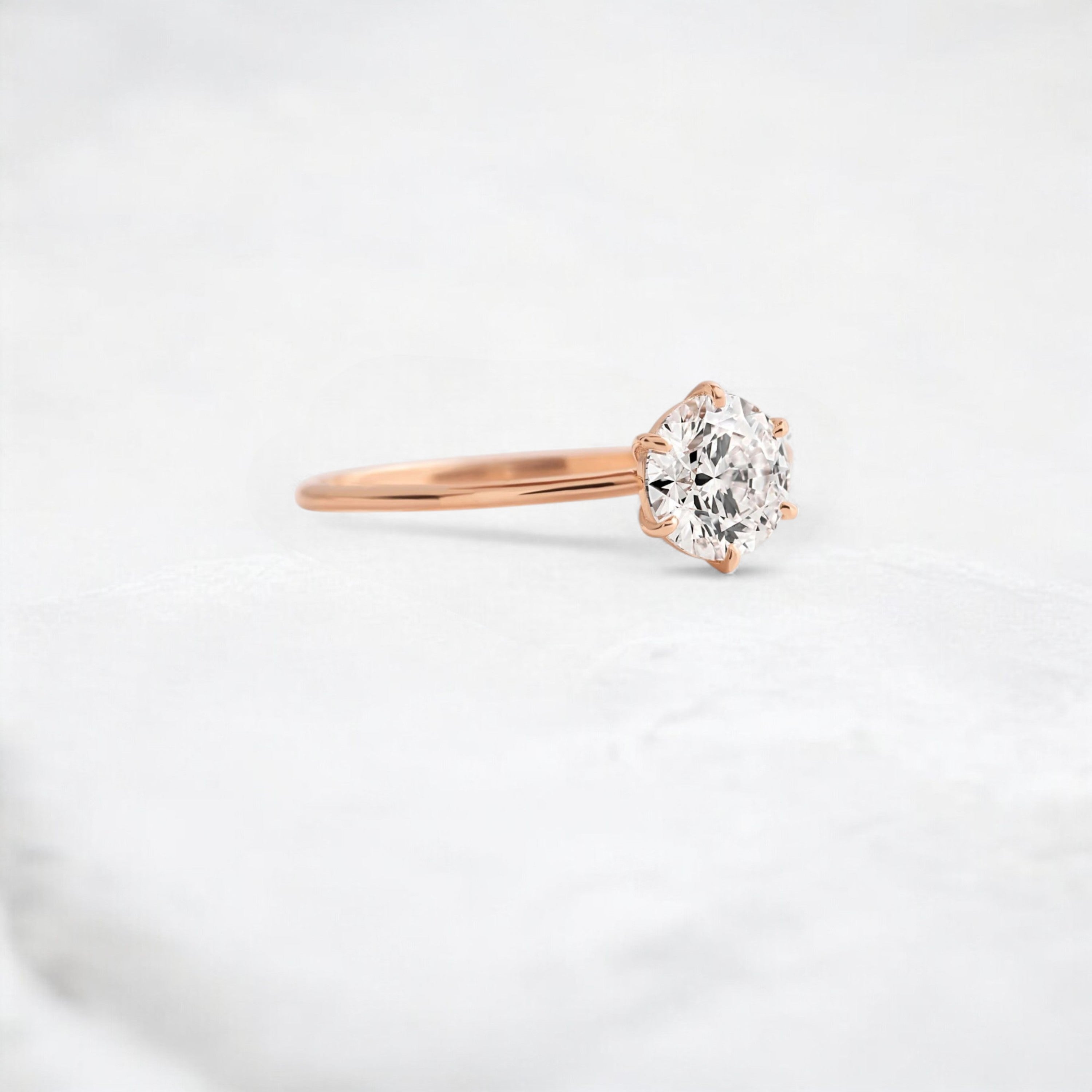 endless-love-round-moissanite-ring-in-golden-embrace-shine-1-ct-rose-gold-gemfora-2