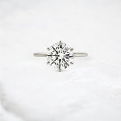 endless-love-round-moissanite-ring-in-golden-embrace-shine-2-4-ct-platinum-gemfora-1