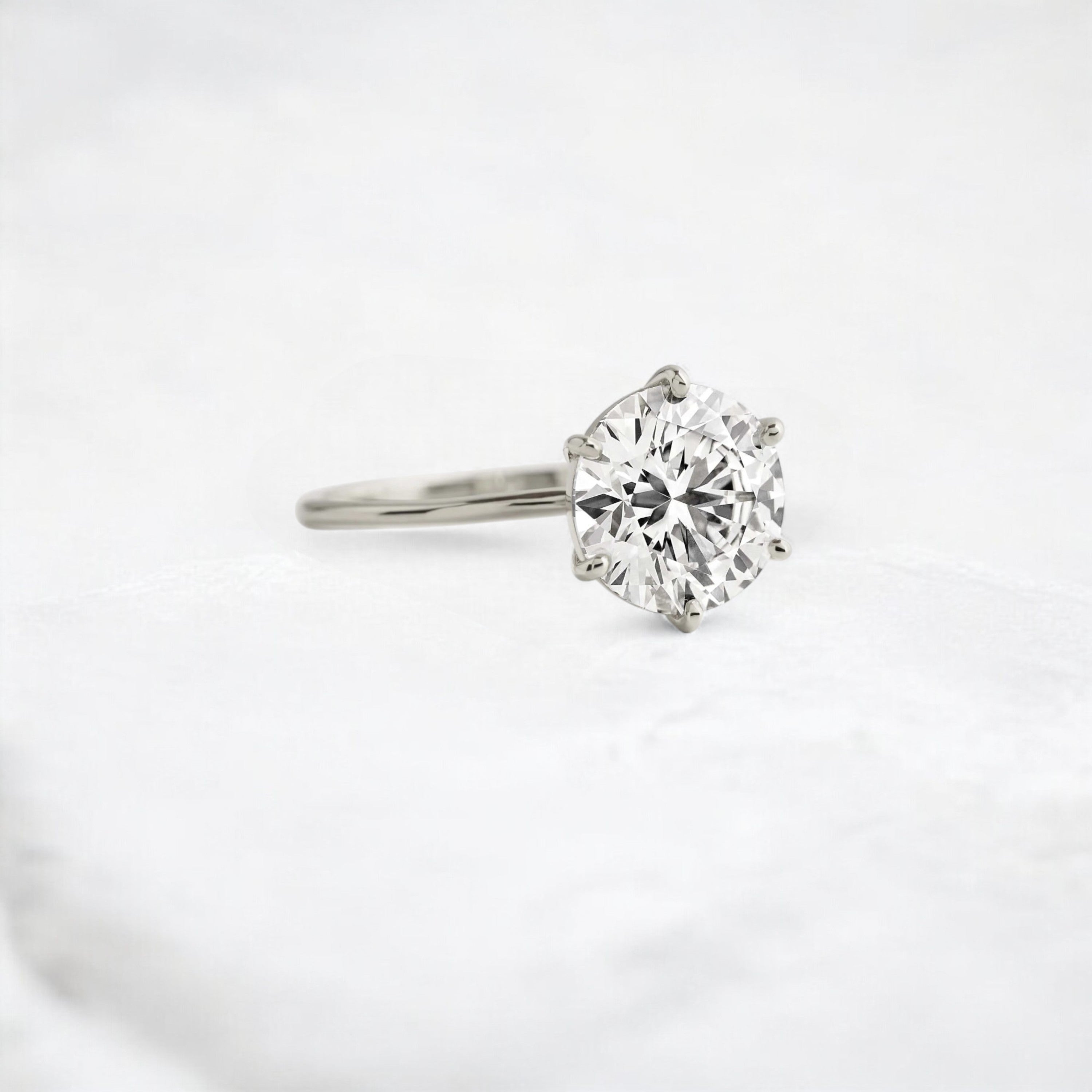 endless-love-round-moissanite-ring-in-golden-embrace-shine-2-4-ct-platinum-gemfora-2