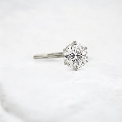 endless-love-round-moissanite-ring-in-golden-embrace-shine-2-4-ct-platinum-gemfora-2