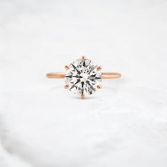endless-love-round-moissanite-ring-in-golden-embrace-shine-2-4-ct-rose-gold-gemfora-1