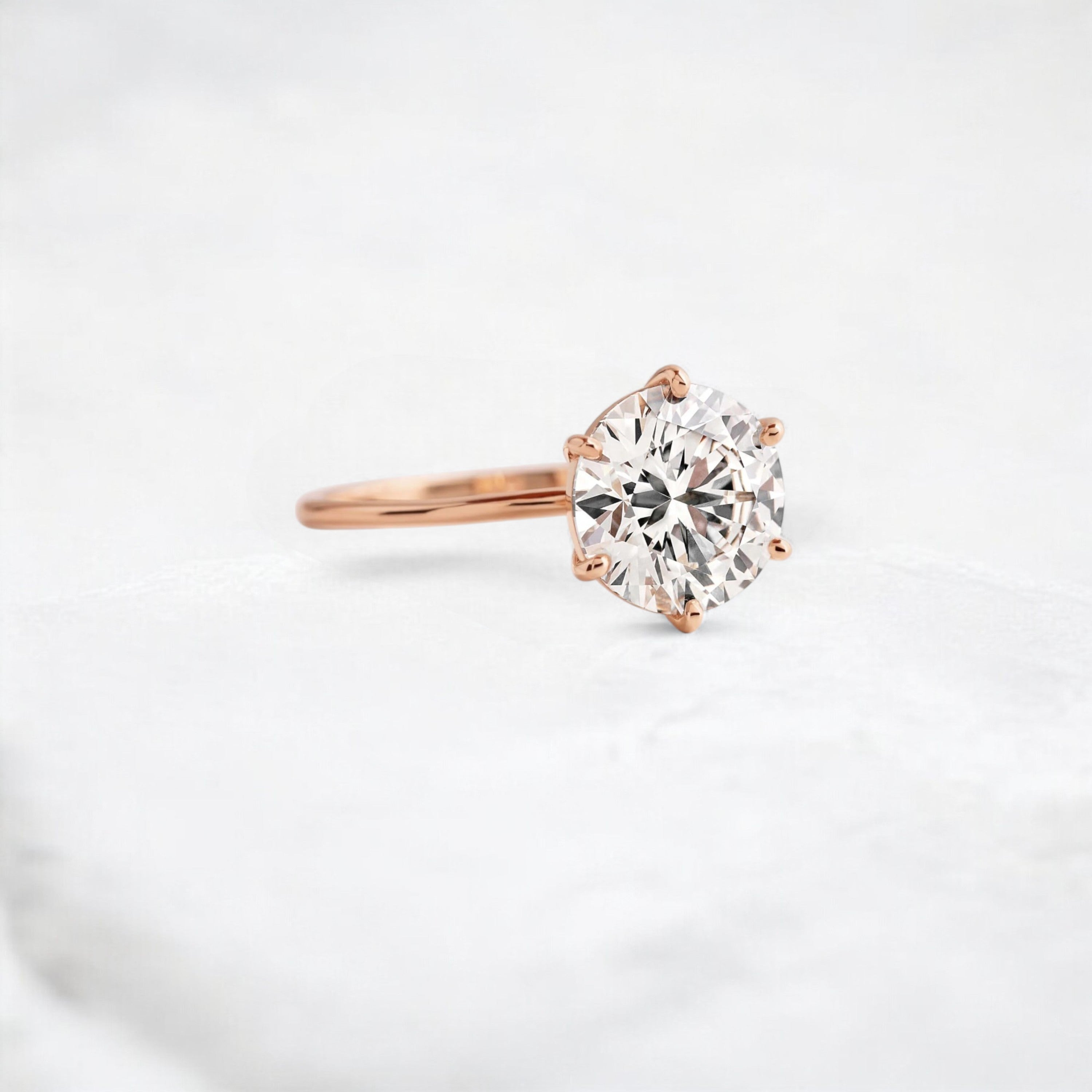endless-love-round-moissanite-ring-in-golden-embrace-shine-2-4-ct-rose-gold-gemfora-2