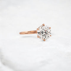 endless-love-round-moissanite-ring-in-golden-embrace-shine-2-4-ct-rose-gold-gemfora-2