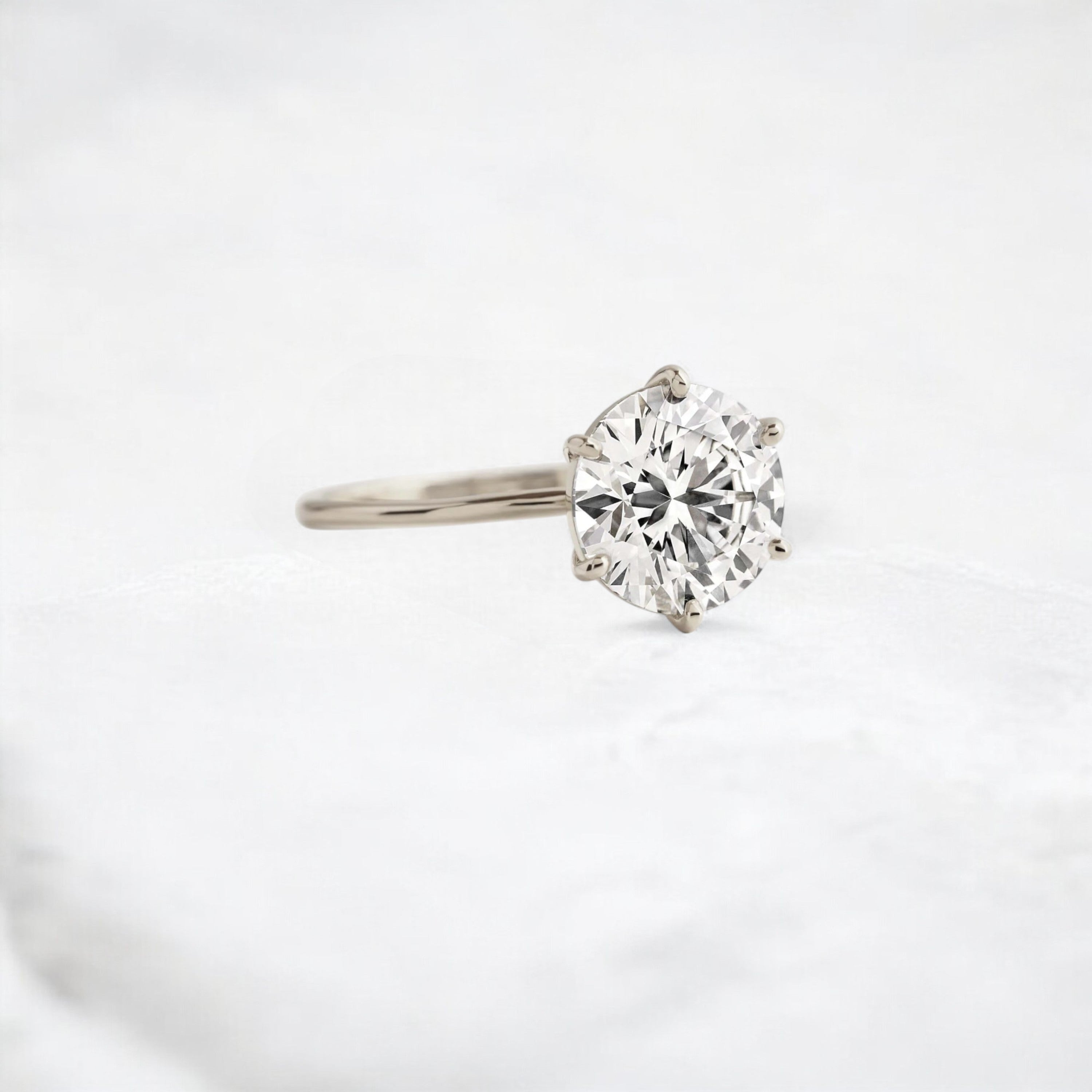 endless-love-round-moissanite-ring-in-golden-embrace-shine-2-4-ct-white-gold-gemfora-2